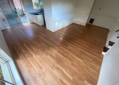 Same living area with new timber-look flooring laid