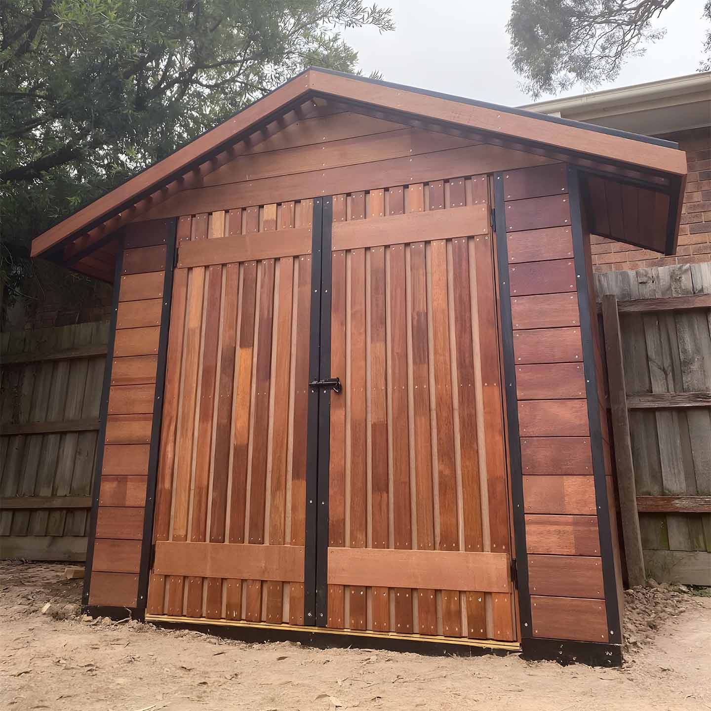 Gabled hardwood garden shed with double doors
